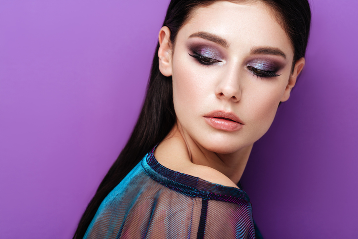 Portrait of a woman w, all shades of purple.